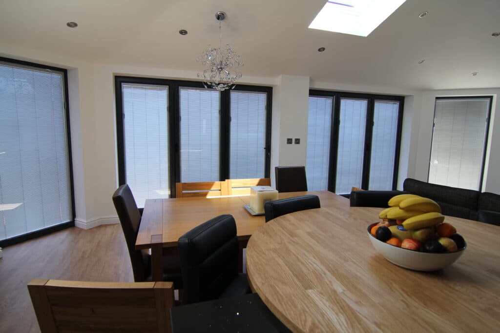 integral blinds in bifold doors in a large new dining room